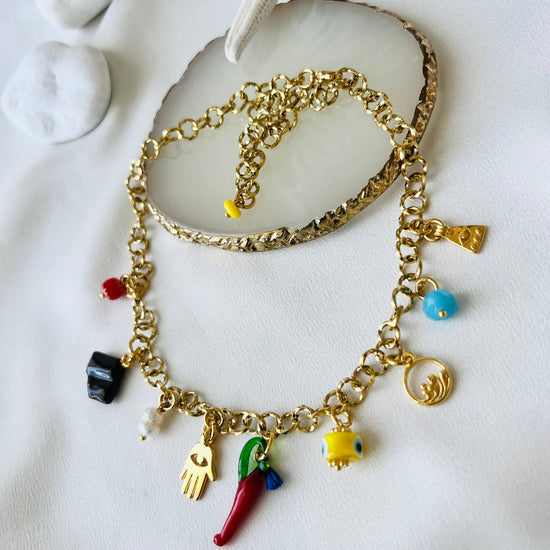 Goupi Goupi - Multi charm summer necklace and dark blue beaded necklace: Blue beaded