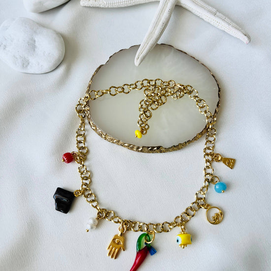 Goupi Goupi - Multi charm summer necklace and dark blue beaded necklace: Blue beaded