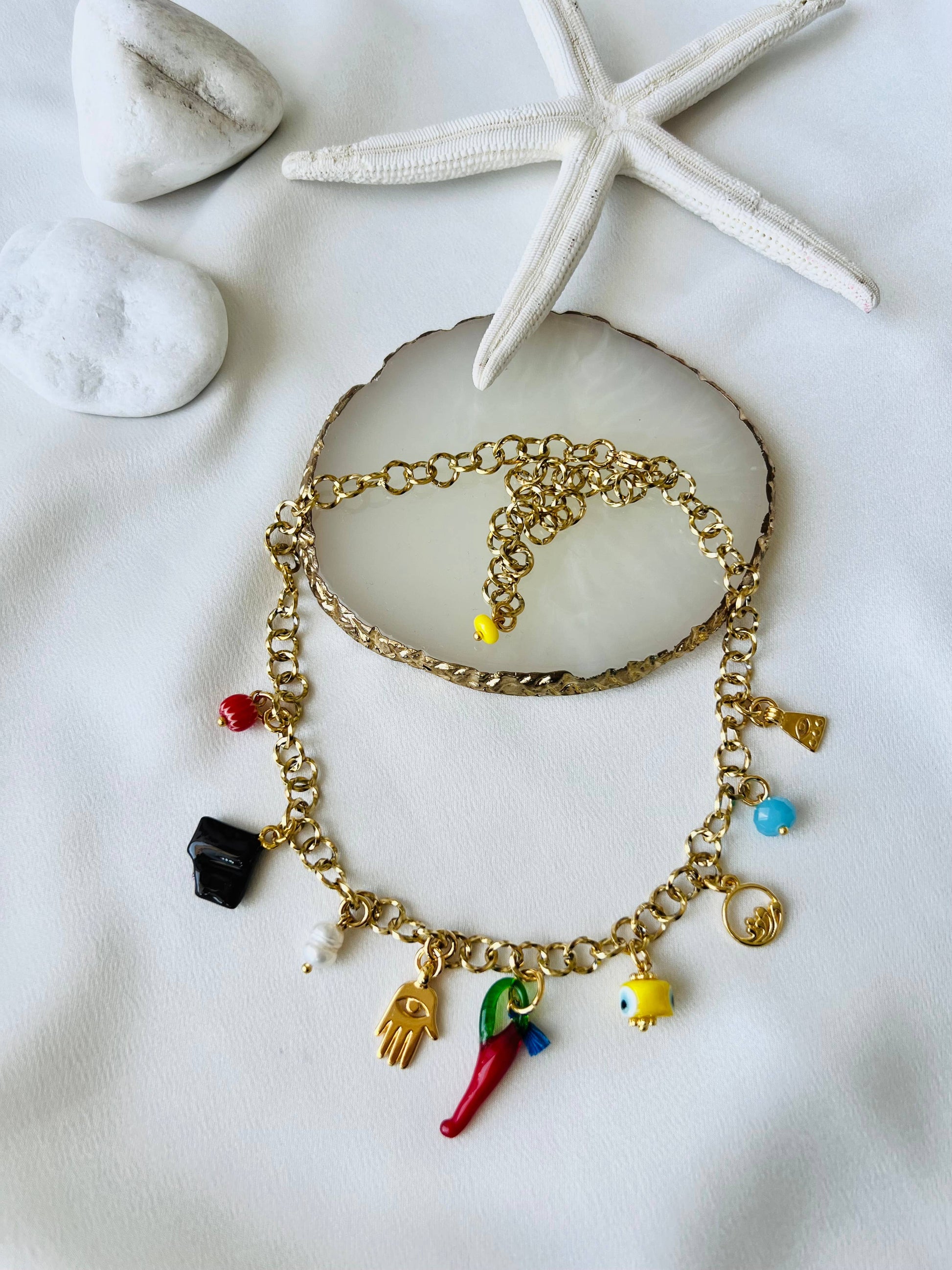 Goupi Goupi - Multi charm summer necklace and dark blue beaded necklace: Blue beaded