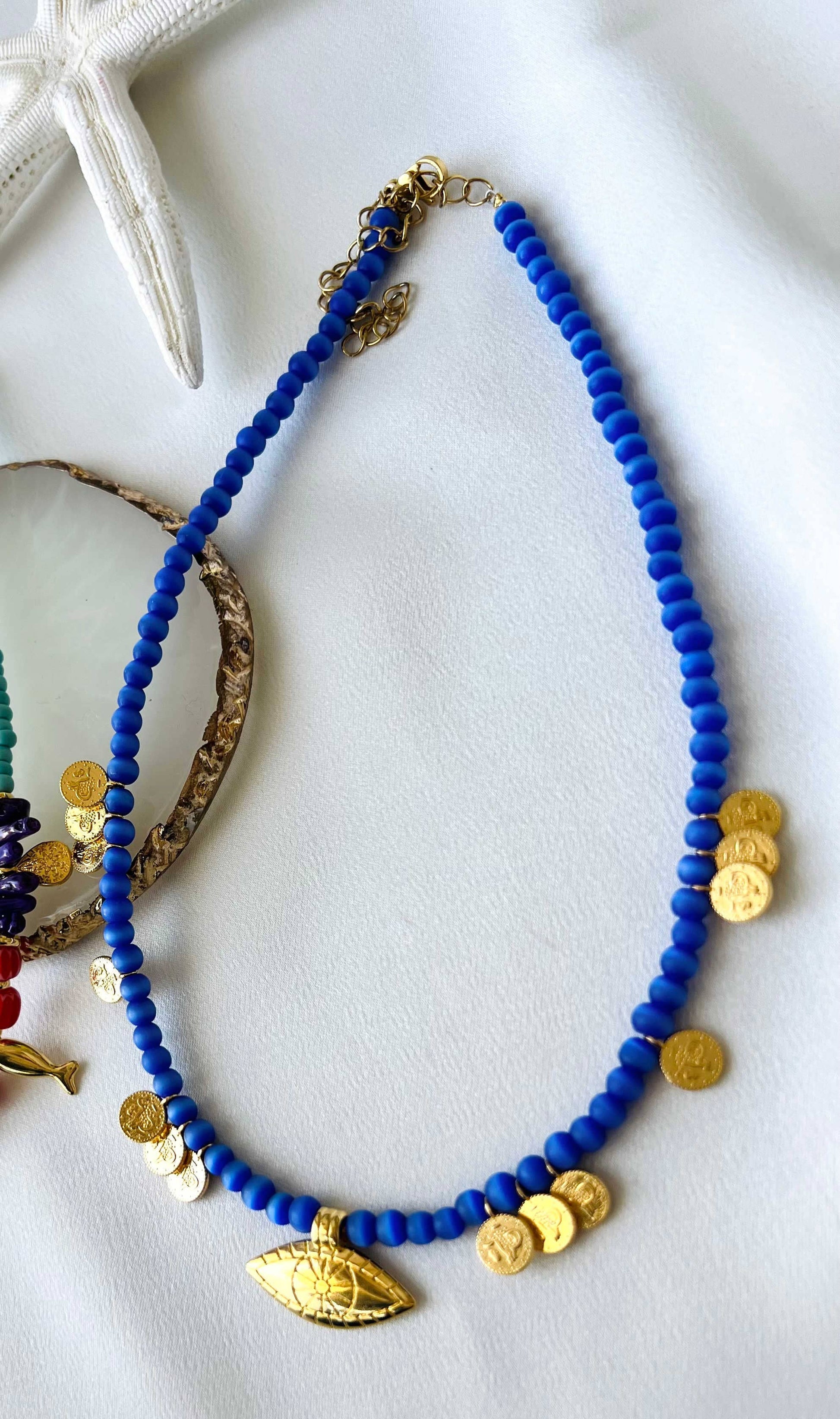 Goupi Goupi - Multi charm summer necklace and dark blue beaded necklace: Blue beaded